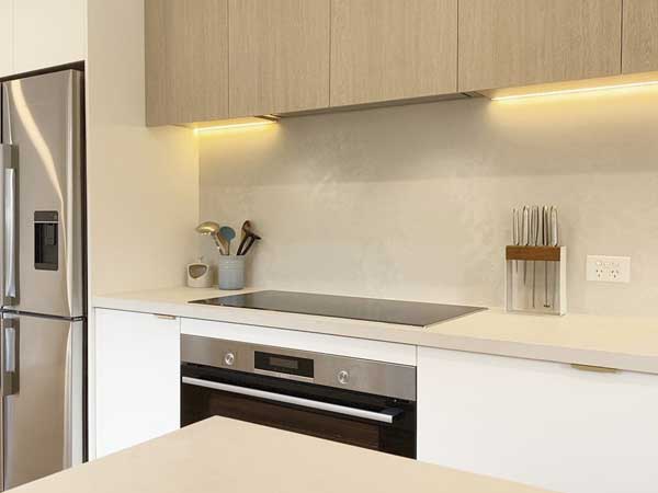 Contemporary White Galley Kitchen in Chadstone