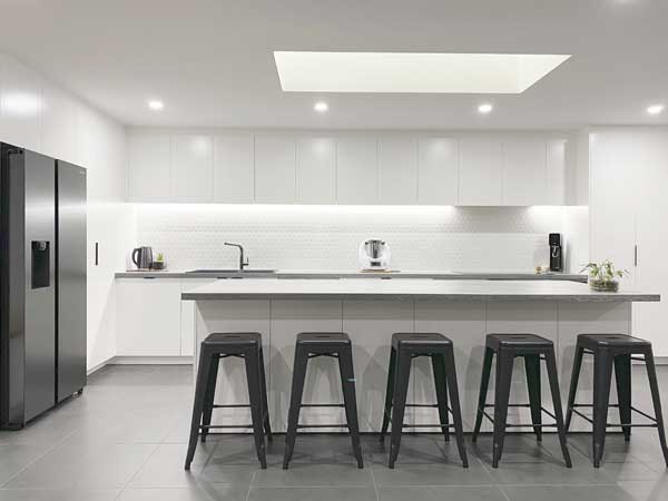 L-Shape White Kitchen with Concrete Finish Benchtop