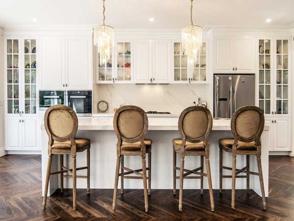 All-White Marble Vein Provincial Galley Kitchen