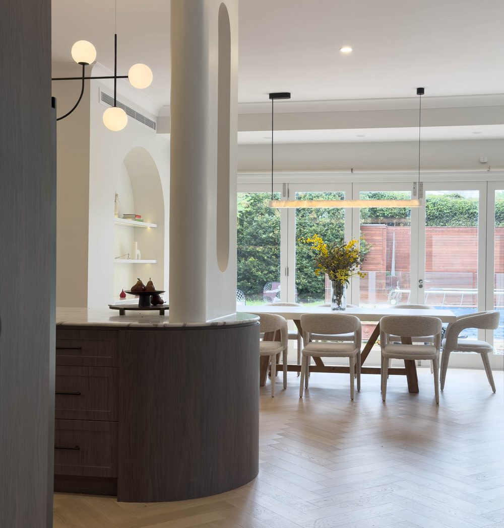 Dining table and chairs opening to the garden